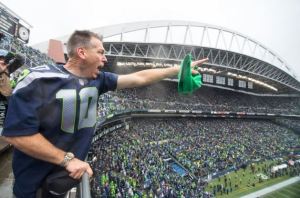Mr. Z rallies the 12s after raising the 12th Man flag on the site of the former Kingdome, where he used to play